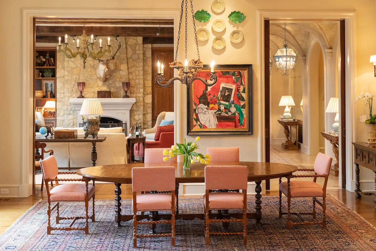 The Riverview Residence, a sitting room with tall windows over the river.